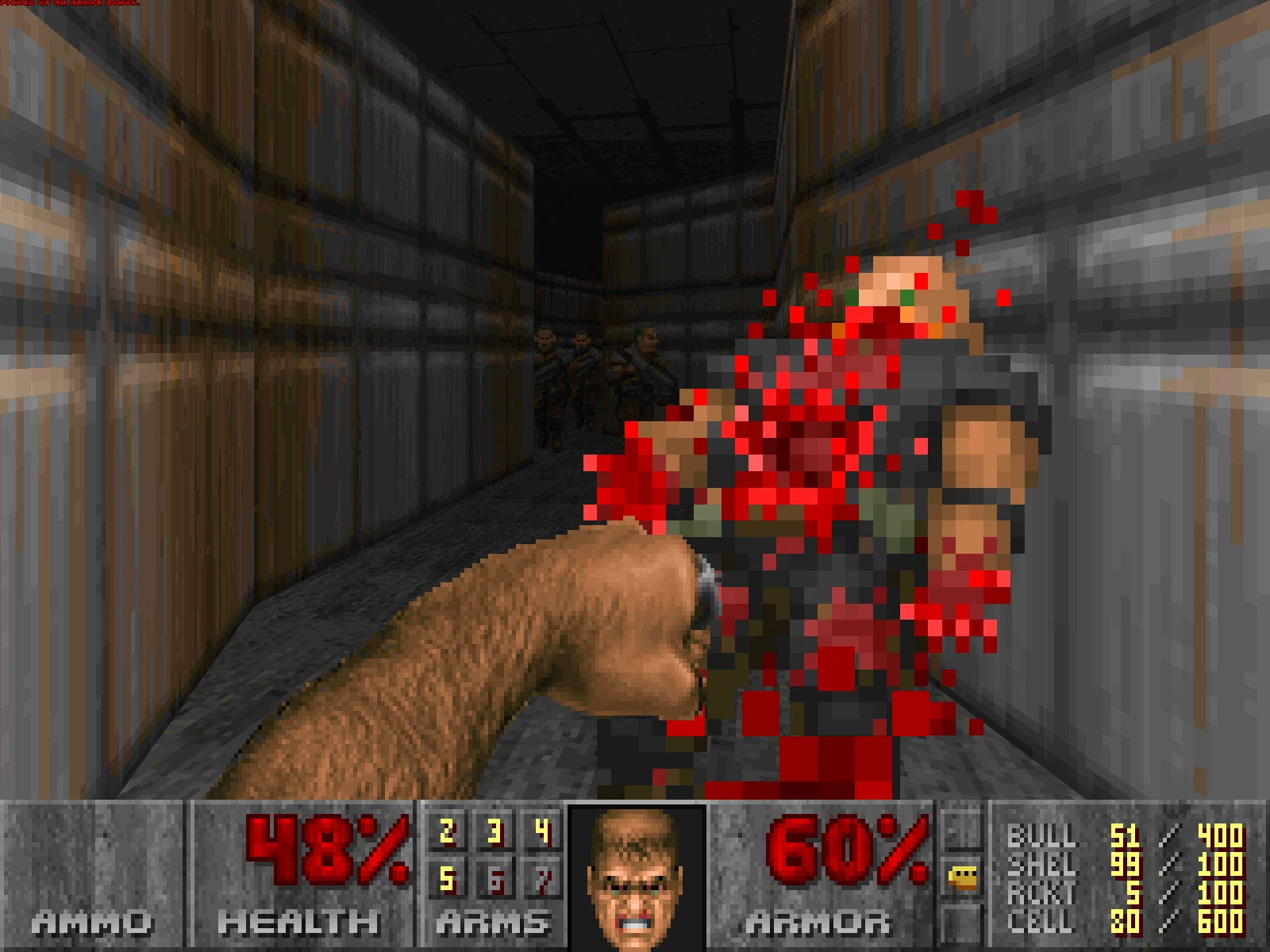 This contains a gameplay image of the game: Screenshot of DOOM